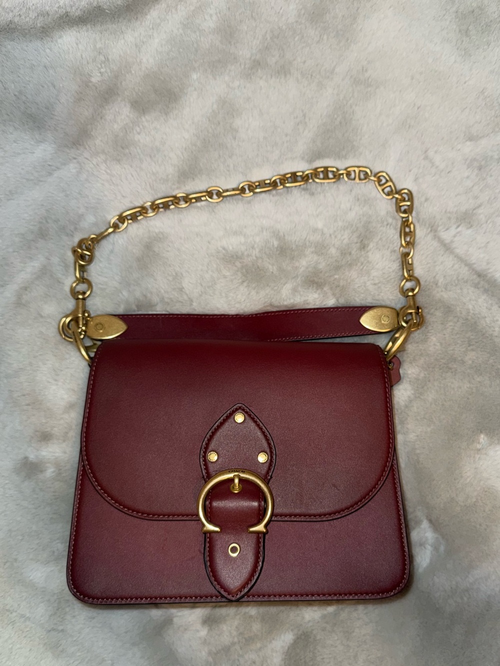 Coach beat bag brass/wine only used once for event